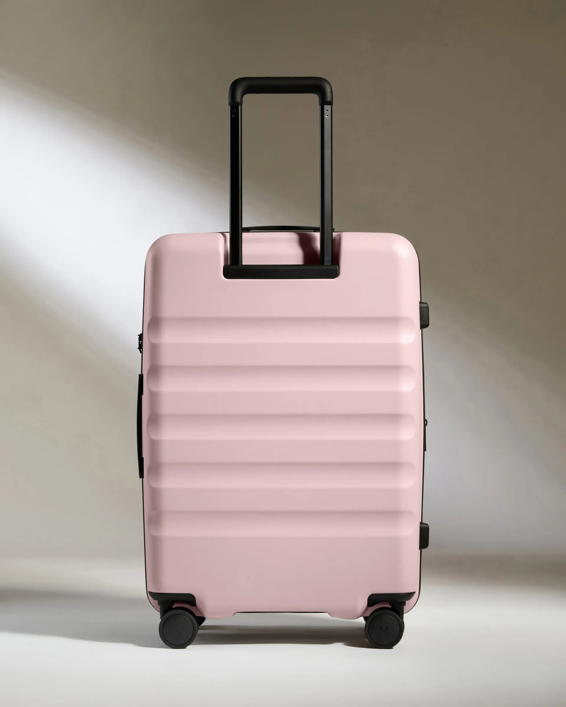 Medium Suitcase in Moorland Pink - Icon Stripe